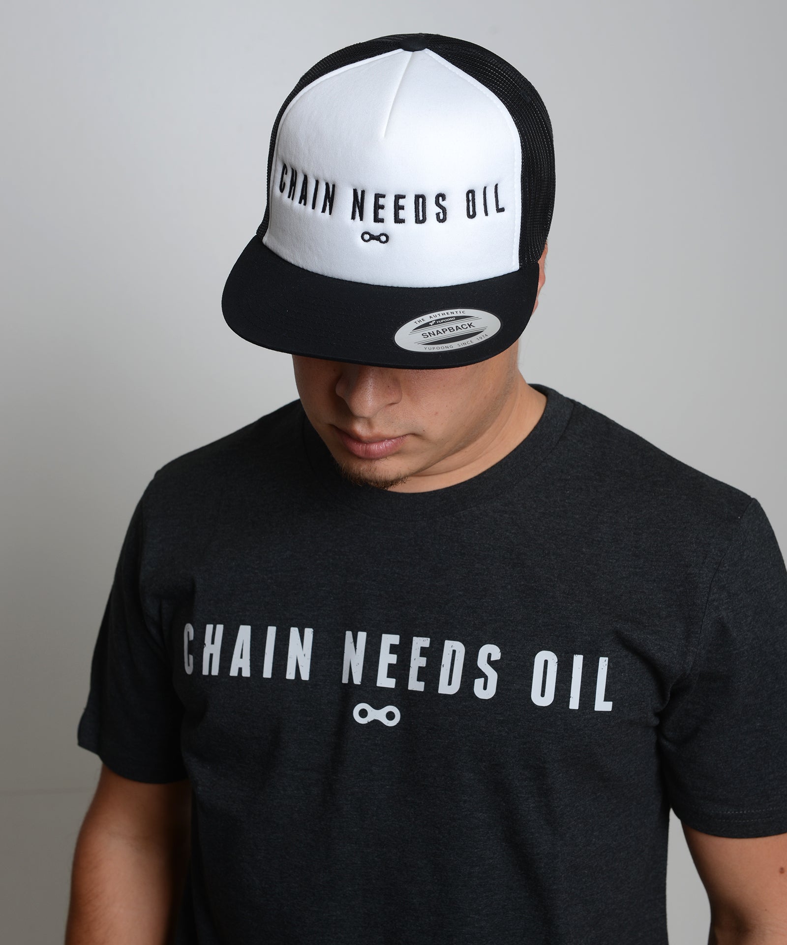 CHAIN NEEDS OIL SNAPBACK